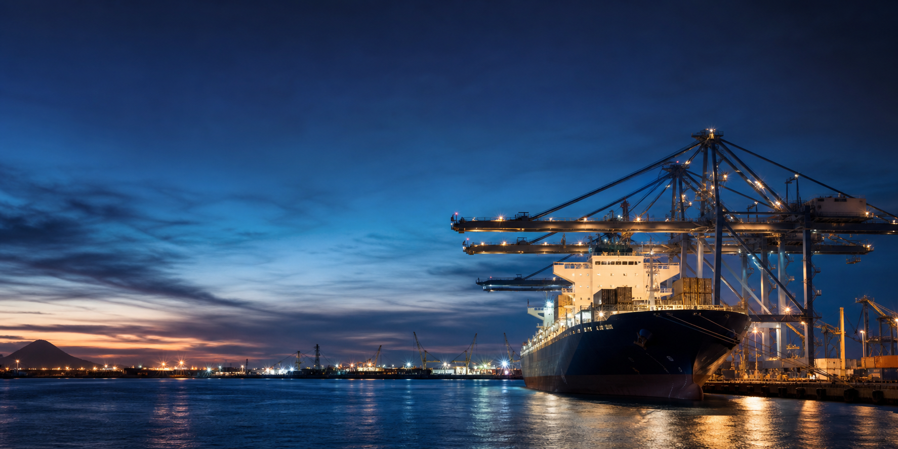 Night port operations with cranes and commercial vessel